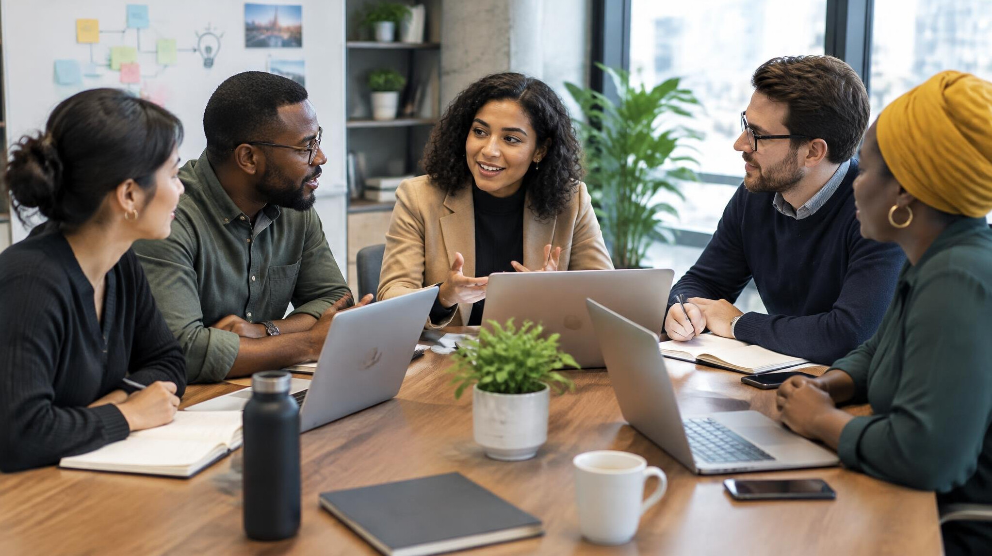 Team of professionals collaborating around a conference table