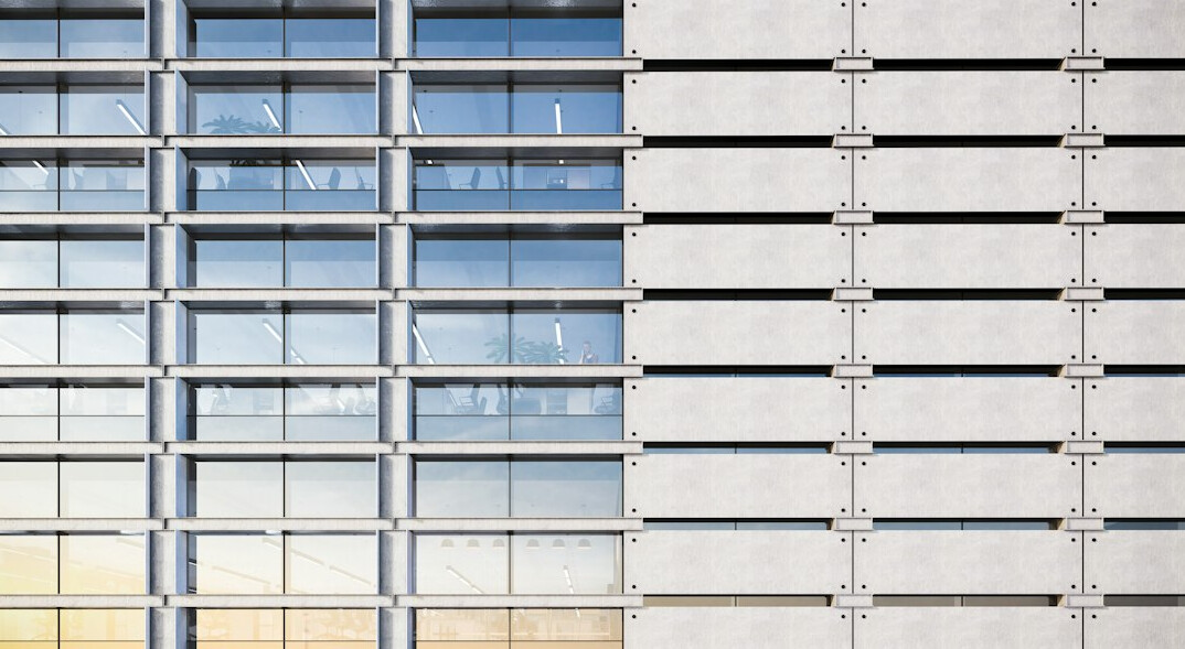 Modern open-plan office interior with large windows